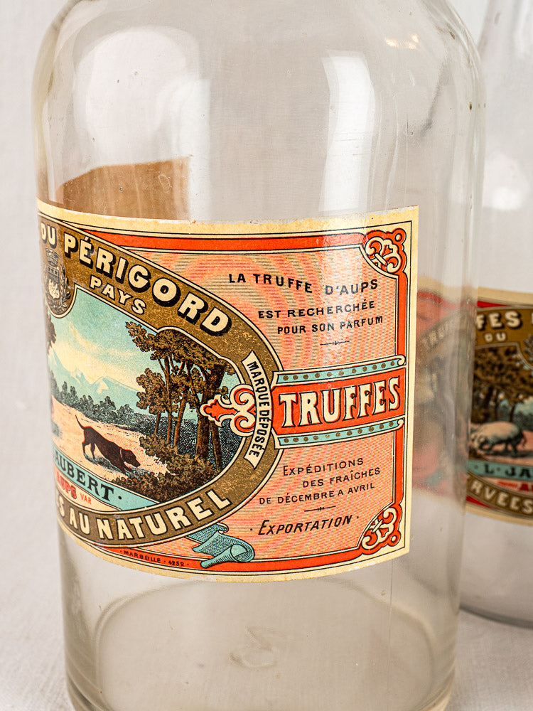 Antique French L. Jaubert truffle jar, vibrant label with “Truffes,” “Perigord,” and scenic landscape.