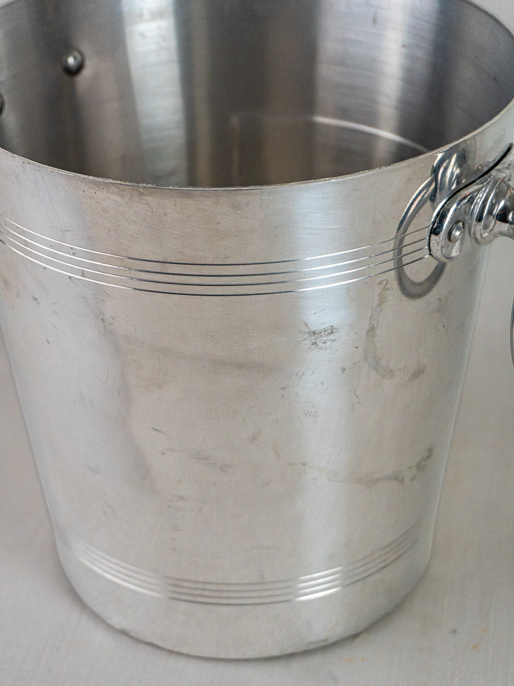 Large vintage Ayala Champagne aluminum bucket with silver finish, side handles, and decorative rim lines.