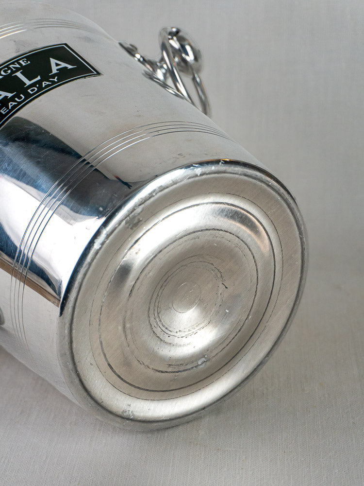 Vintage French Argit aluminum Ayala Champagne Bucket base with faint rings and partial side label.