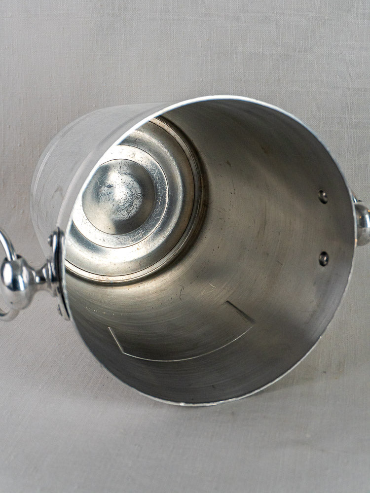 Ayala vintage French Argit aluminum champagne bucket displayed on its side against a neutral background.