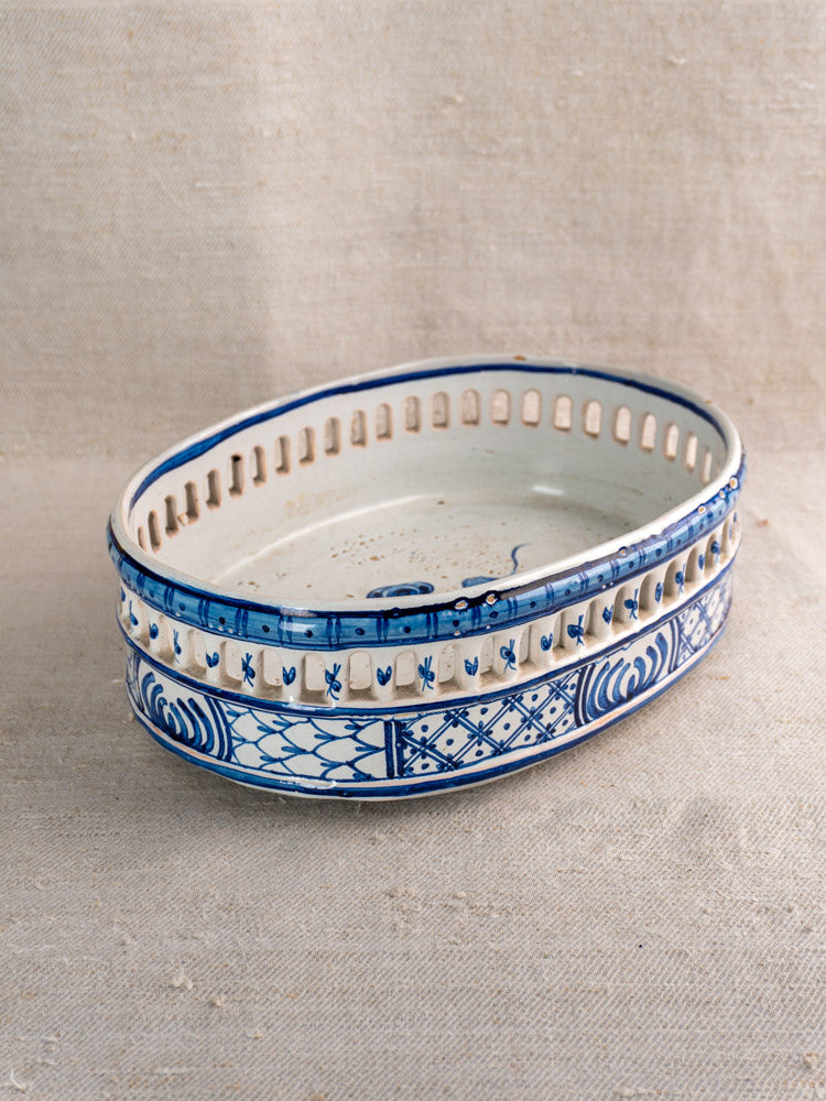 Antique French faience jardinière by Pouplard Béatrix Malicorne, cobalt blue glaze, geometric floral motifs, on neutral fabric.