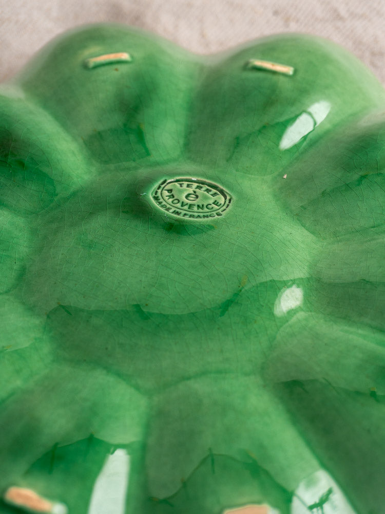 Antique French Dieulefit ceramic melon dish, emerald green glaze, scalloped edge, T.G. Provence stamp, fine crackle detail.