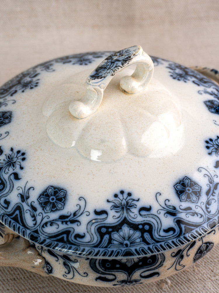 Antique French Badonviller Étoile covered serving dish, circa 1900, with blue floral motifs on cream and gentle age patina.
