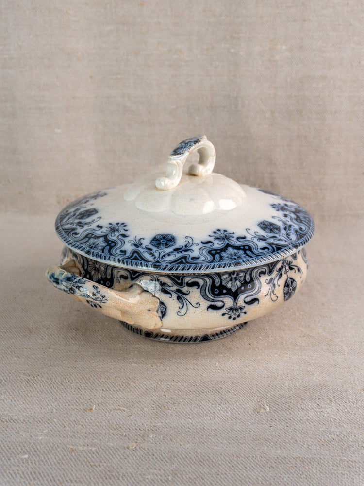 Antique French Badonviller Étoile covered serving dish, circa 1900, with ornate handle and blue floral motifs on cream.
