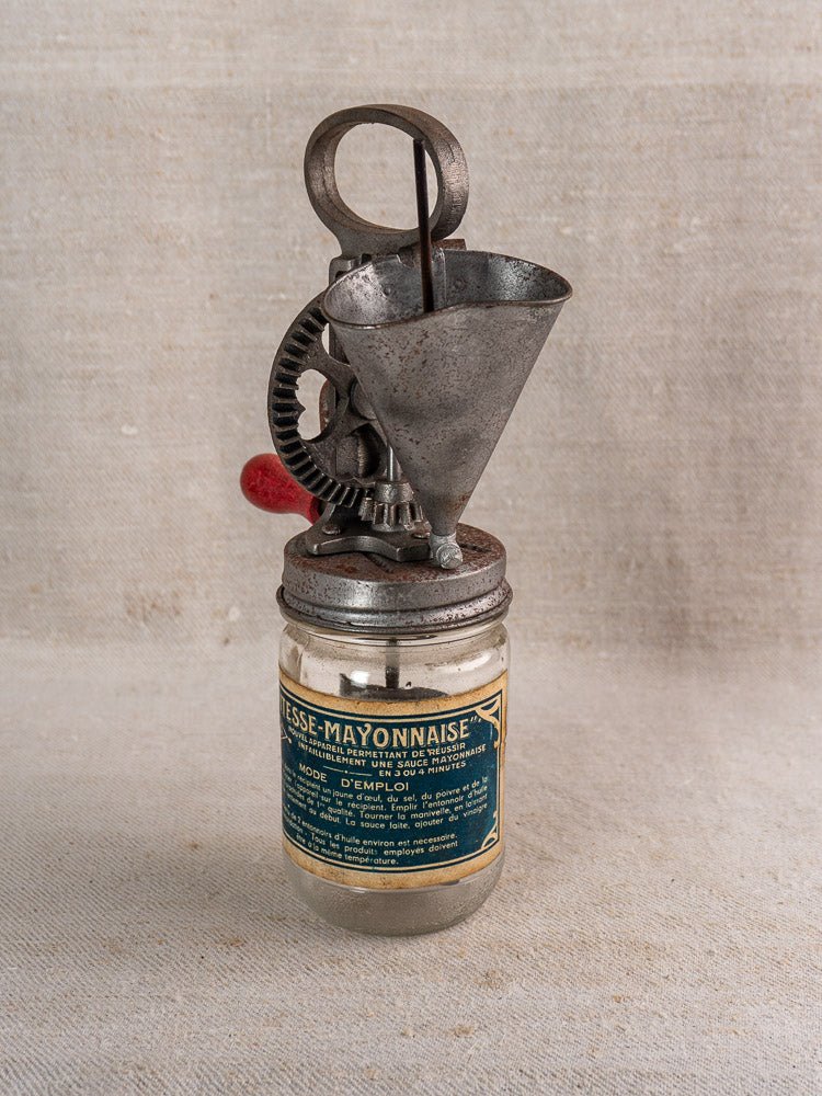 Antique French Vitesse Baratte mayonnaise maker, vintage glass jar with blue label and metal mixer.