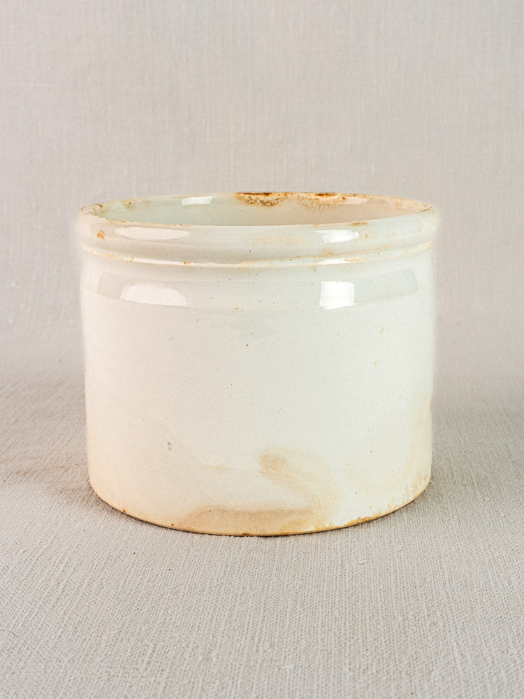 Antique French Fenal Badonviller rillettes pot in off-white ironstone with vintage brownish patina.