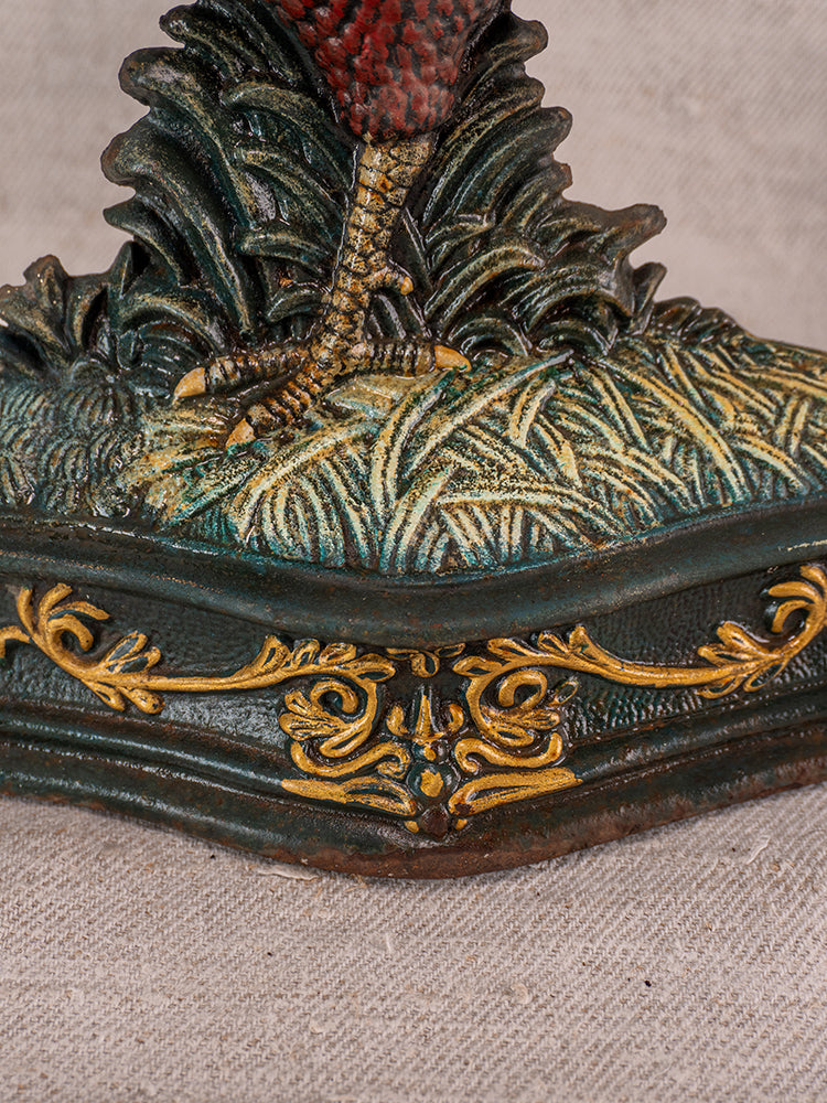Antique French cast iron rooster doorstop with gold accents and green details, late 19th century.
