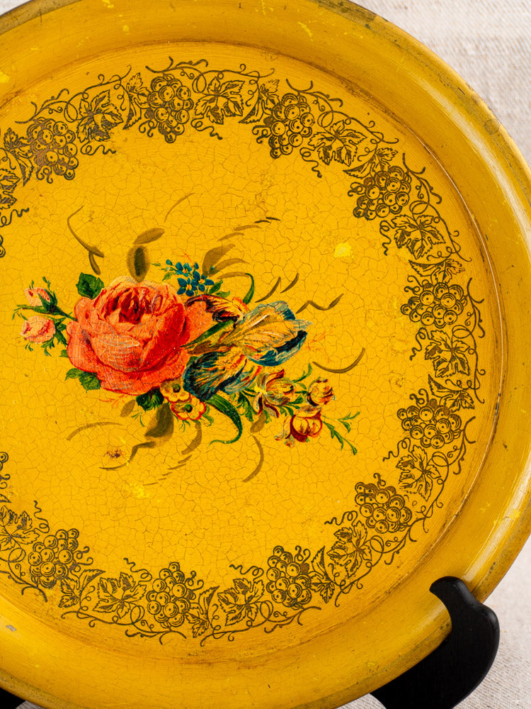 Antique French tole tray with yellow lacquer, hand-painted red rose, ornate gold border, vintage patina.