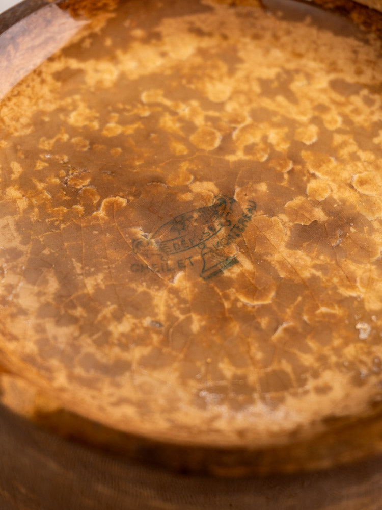 Aged mottled drumhead with Rogers Drums stamp, surface showing patina and rich texture variations.