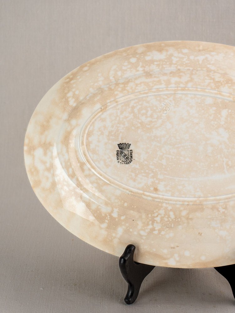 Vintage French Sarreguemines ivory ironstone platter with beige mottled design and black maker’s mark.