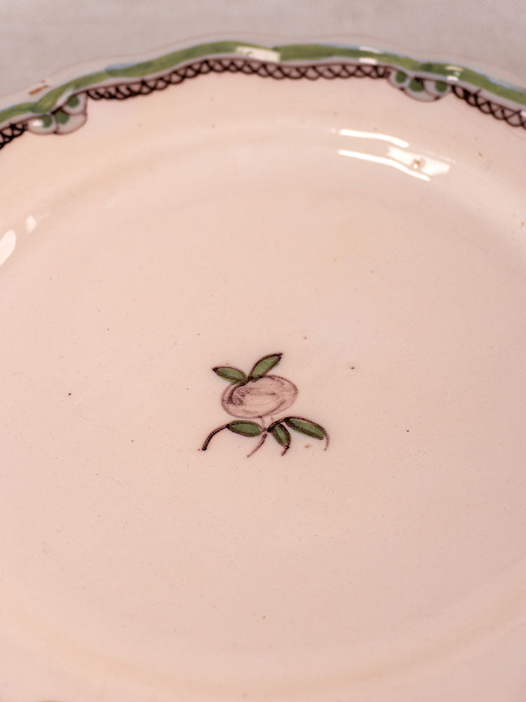 Antique French faience plates with hand-painted turnip motif, green and brown rim on cream. Sold in a pair.