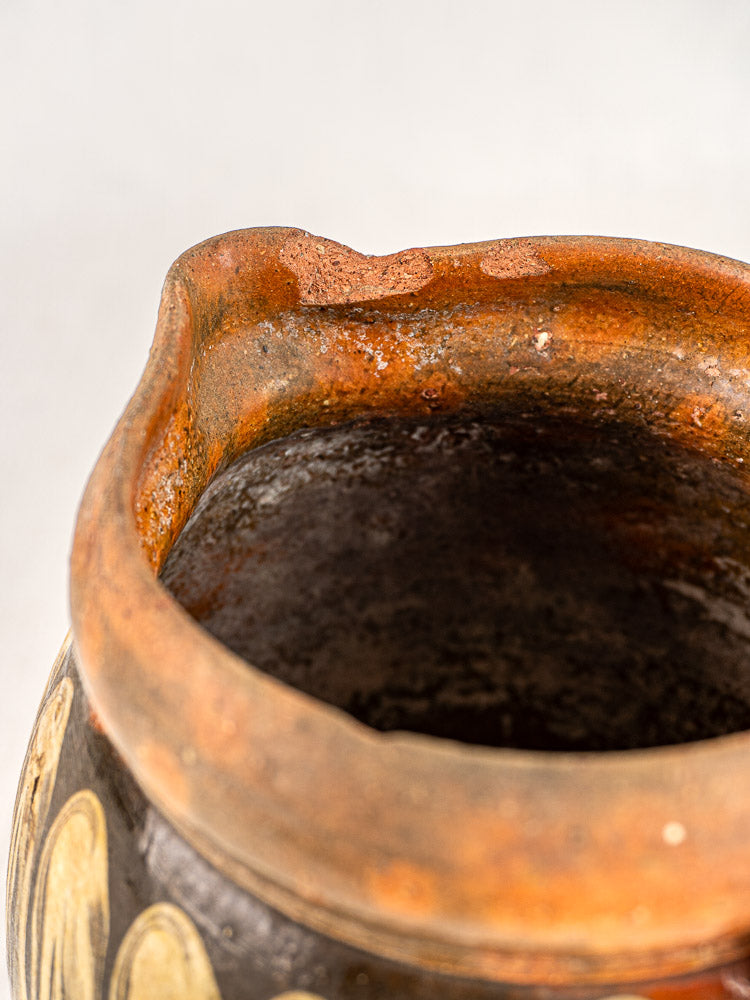 Antique French Pichet Jaspé Savoie slipware, late 19th century, rustic brown clay and chipped rim.