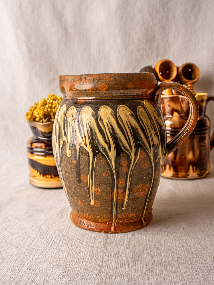 Antique French pichet jaspé, late 19th century Savoie, brown slipware pottery with yellow dripped glaze.