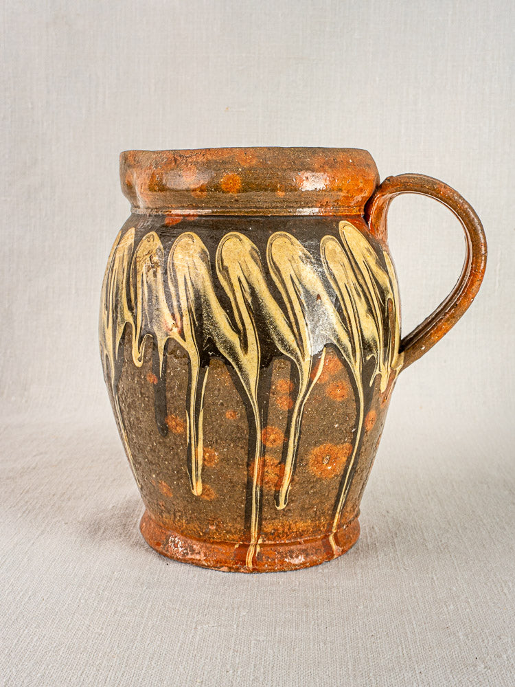 Antique French pichet jaspé, late 19th century Savoie, brown slipware pottery with yellow dripped glaze.