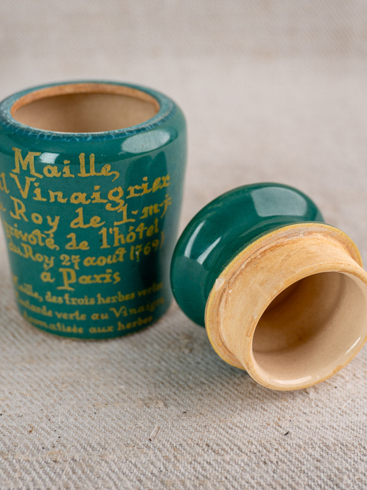 Teal and yellow vintage French Maille mustard pot with matching lid, yellow Paris text, light brown glazed interior.