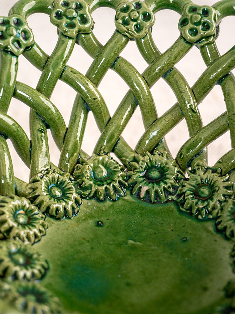 Vintage French Pichon Uzès woven basket with glossy green glaze, lattice pattern, and raised floral rim details.