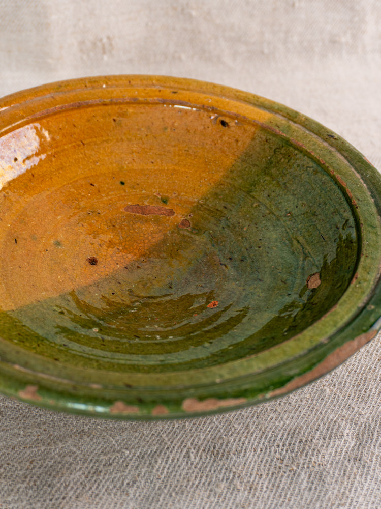 Antique French Provençal compotier with green and ochre glaze, late 19th century rustic earthenware pottery.