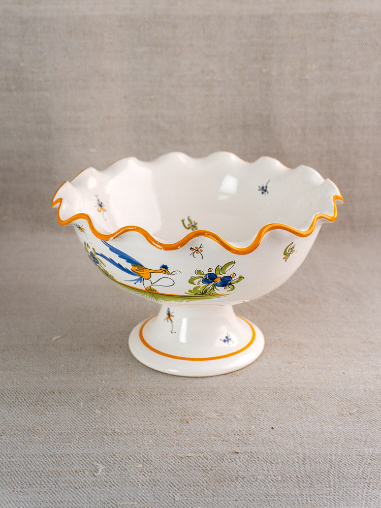Pair of vintage French Moustiers-style compotes, hand-painted faience with bird and floral motifs.