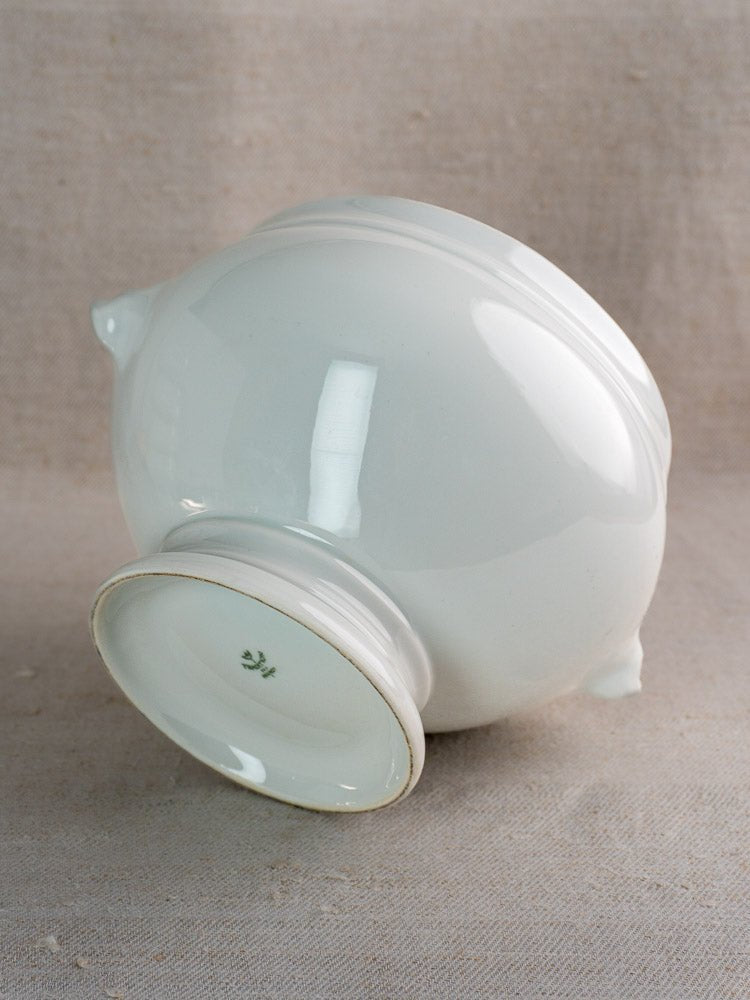 White Vintage French CNP Soup Service lion head bowl showing unglazed base with green mark.