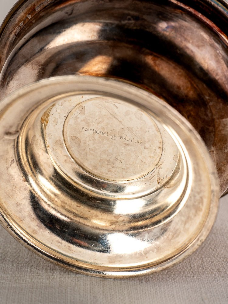 Close-up of the base of a vintage Sambonet Italian silver-plated dessert coupe with engraved maker’s mark.