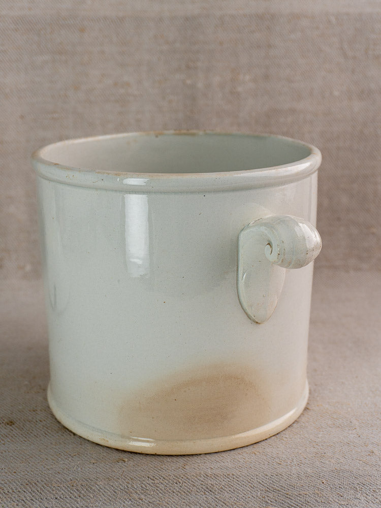 Antique French Lunéville white faience soup tureen with single handle, gentle base discoloration.