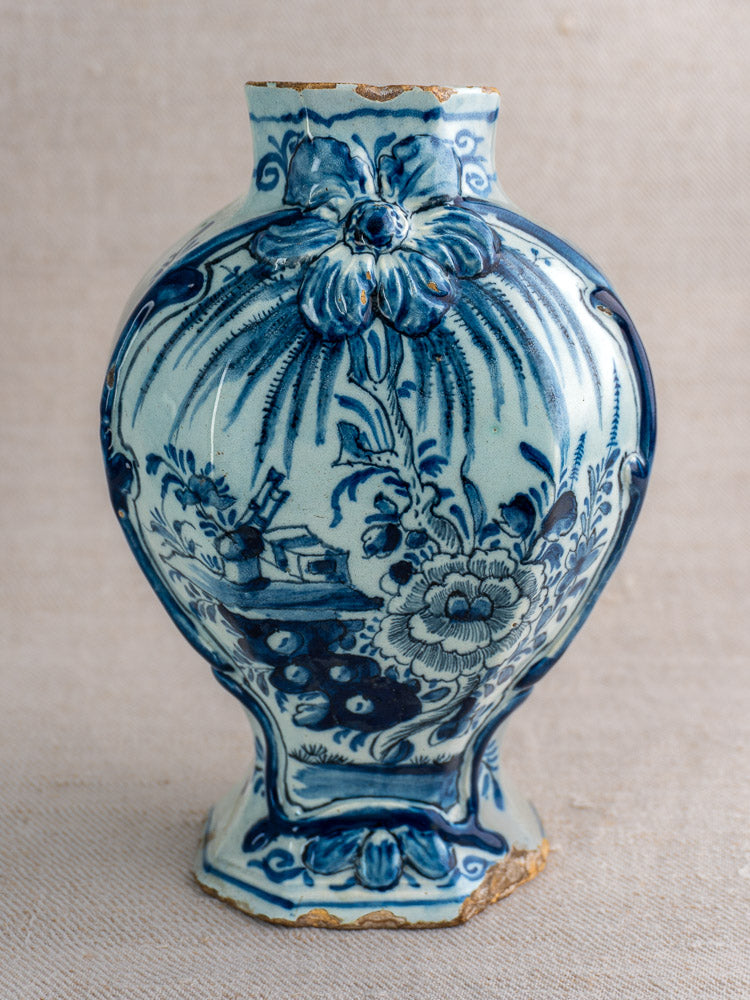 Pair of antique Dutch Delft vases, blue and white c. 1700, floral motifs, Pieter Kam, minor rim and base wear, fabric backdrop.