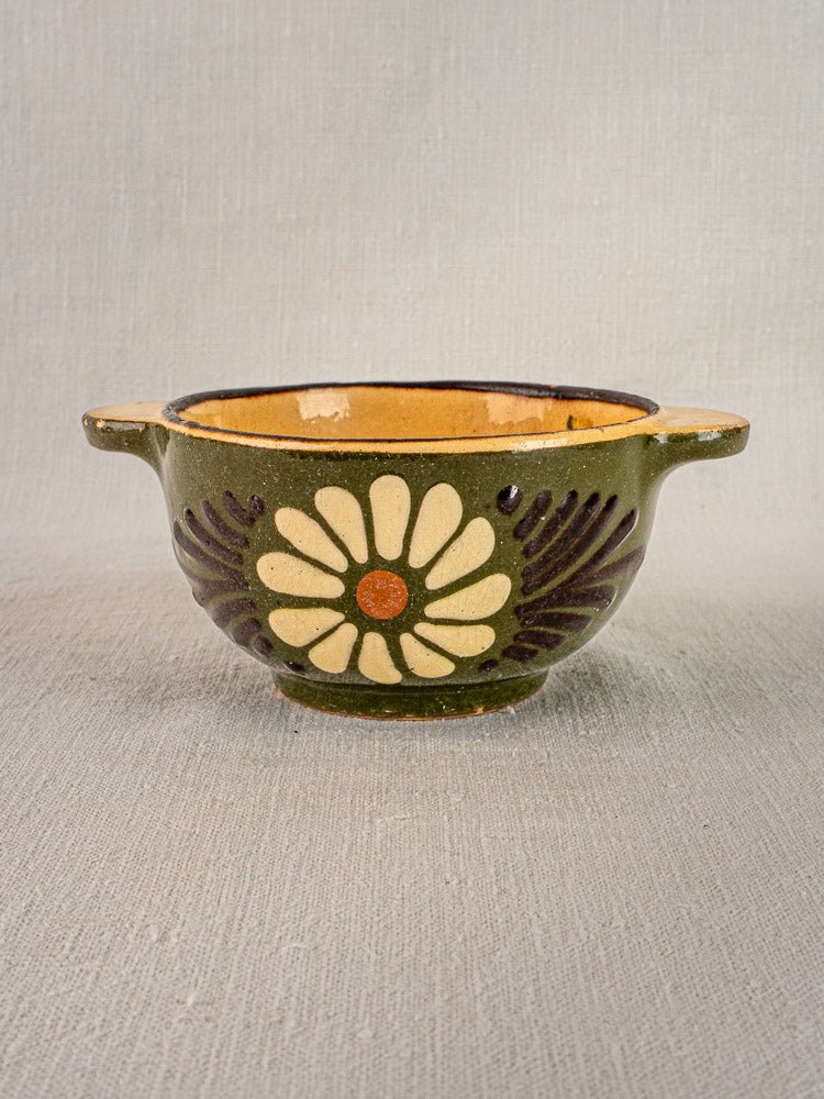 Pair of vintage French Savoyard green glazed bowls with side handles, floral motifs, tan interiors.