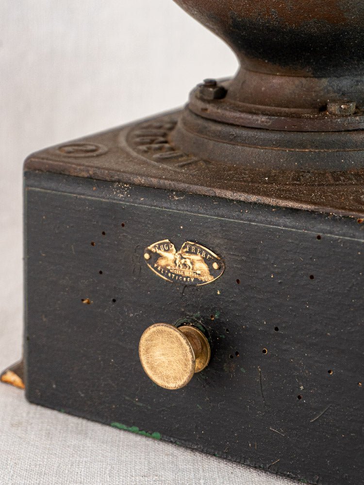 Antique French Peugeot Frères coffee mill, circa 1900, black cast iron base, gold knob, vintage patina.