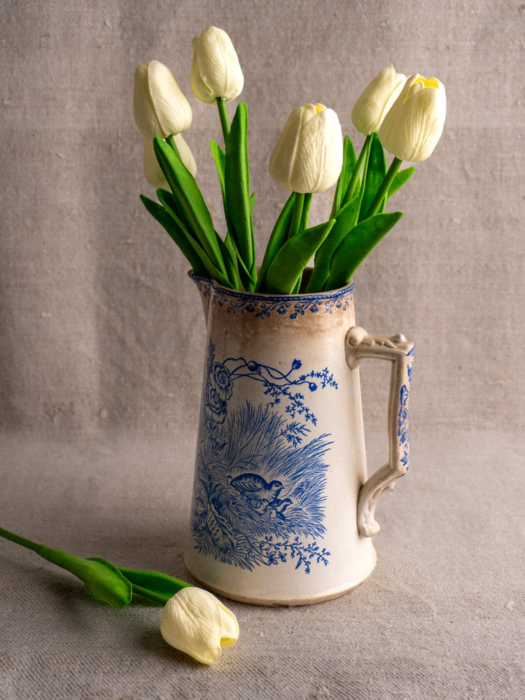 Antique French Fenal Frères Pichet, Pexonne Oiseaux pattern, blue floral design, filled with white tulips.