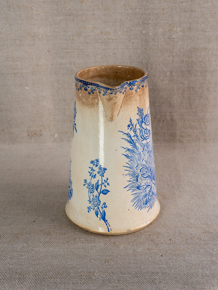 Antique French Fenal Frères Pichet in Pexonne Oiseaux pattern with blue floral transferware on beige.