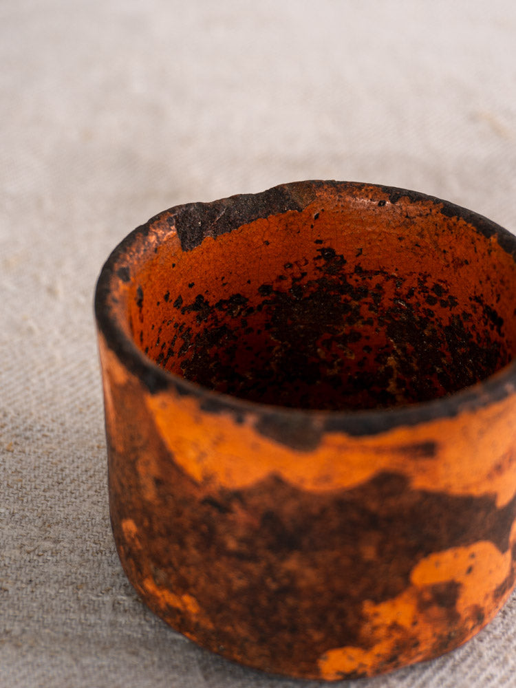 Rustic 19th century French ceramic cheese strainers with speckled finish and uneven rims, sold as a pair.