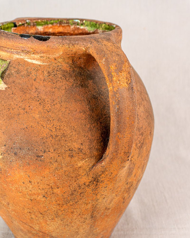 Antique French vinaigrier, glazed terracotta vinegar pot c. 1880–1900 with rustic tones and handle.