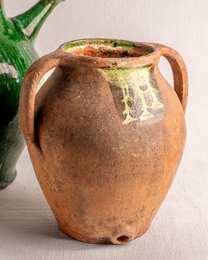 Antique French vinaigrier, glazed terracotta vinegar pot with brown and green accents, c. 1880–1900.