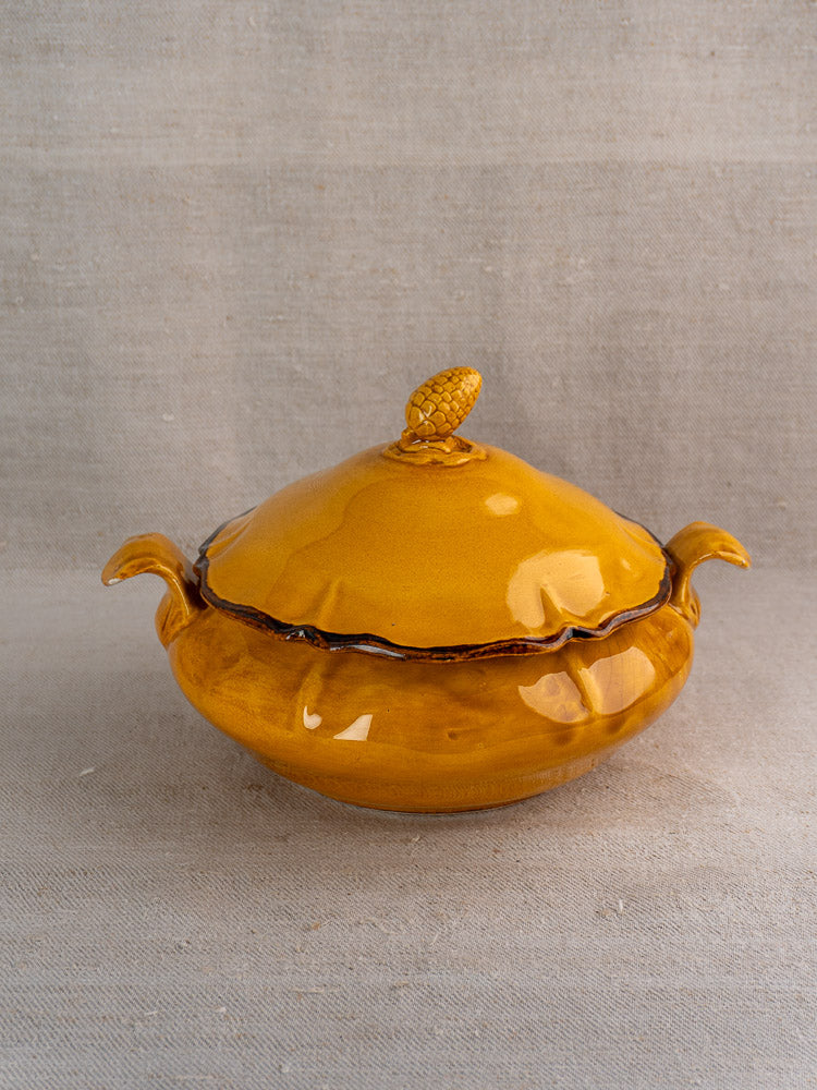 Vintage French Haute Provence yellow faience tureen with two handles, pine cone finial, ochre glaze.