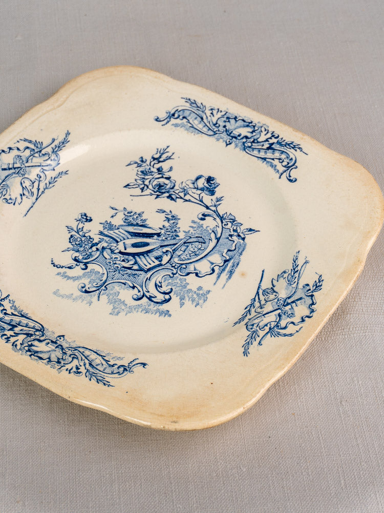 Set of 10 antique French Clairefontaine plates, c.1885, with blue floral scrolls and rounded corners, worn edges, light discoloration.