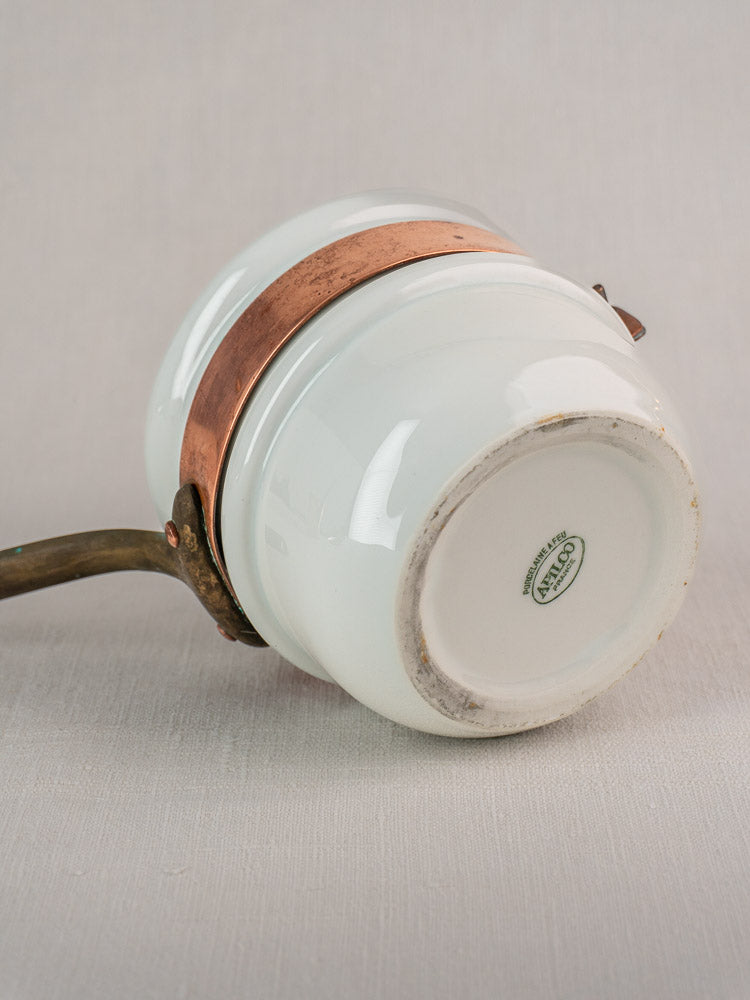 Mid-20th-century French copper bain marie with Apilco porcelain insert, showing green Ceraflame logo on neutral background.