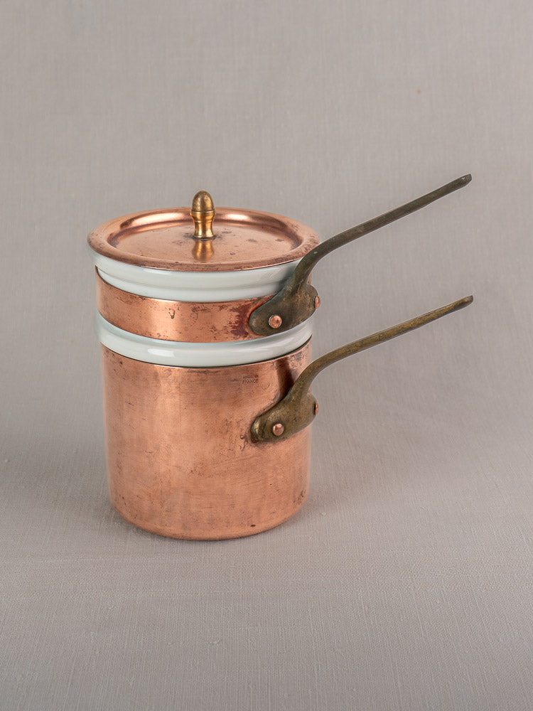Antique French copper Bain Marie pots with long handles, white enamel rims, Apilco porcelain insert, vintage patina.
