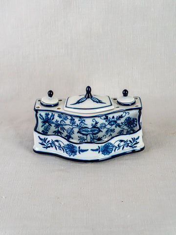 Blue and white ironstone inkstand with Blue Onion floral motif, two lidded containers, light background.