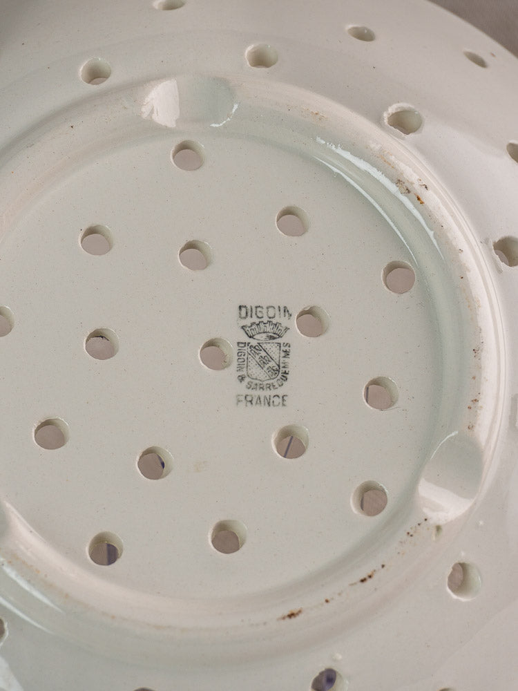 Antique French white stoneware berry strainer by Digoin Sarreguemines, with drainage holes and black maker’s stamp.