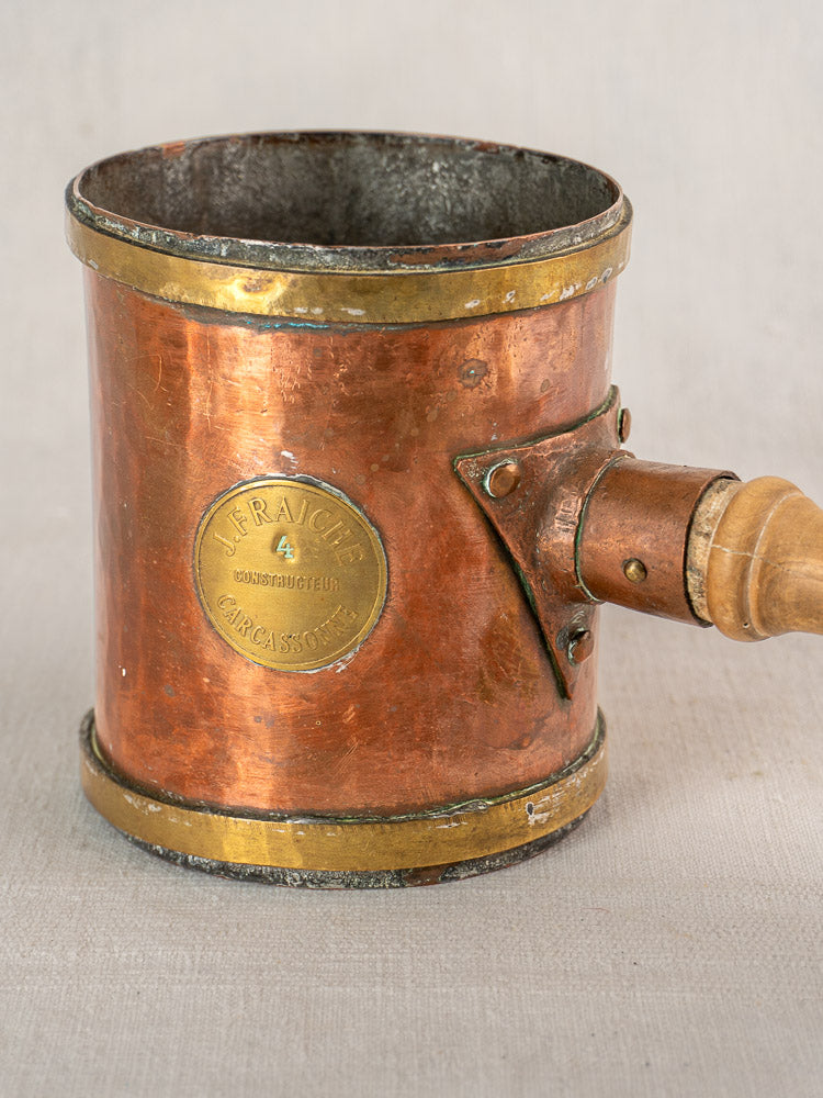 Antique French copper strainer pot with brass saucepan, wood handle, L. Fraiche Carcassonne metal label, rustic patina.