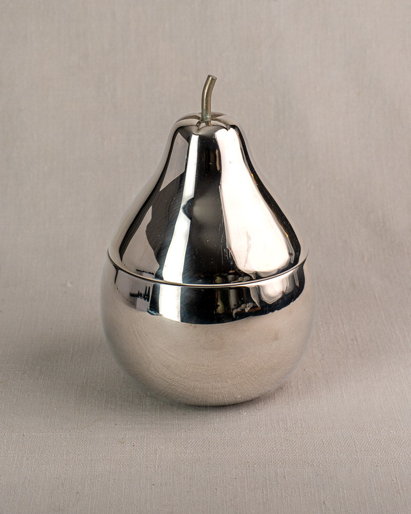 Vintage French stainless steel pear ice bucket with removable lid, mid-century barware on pale surface.