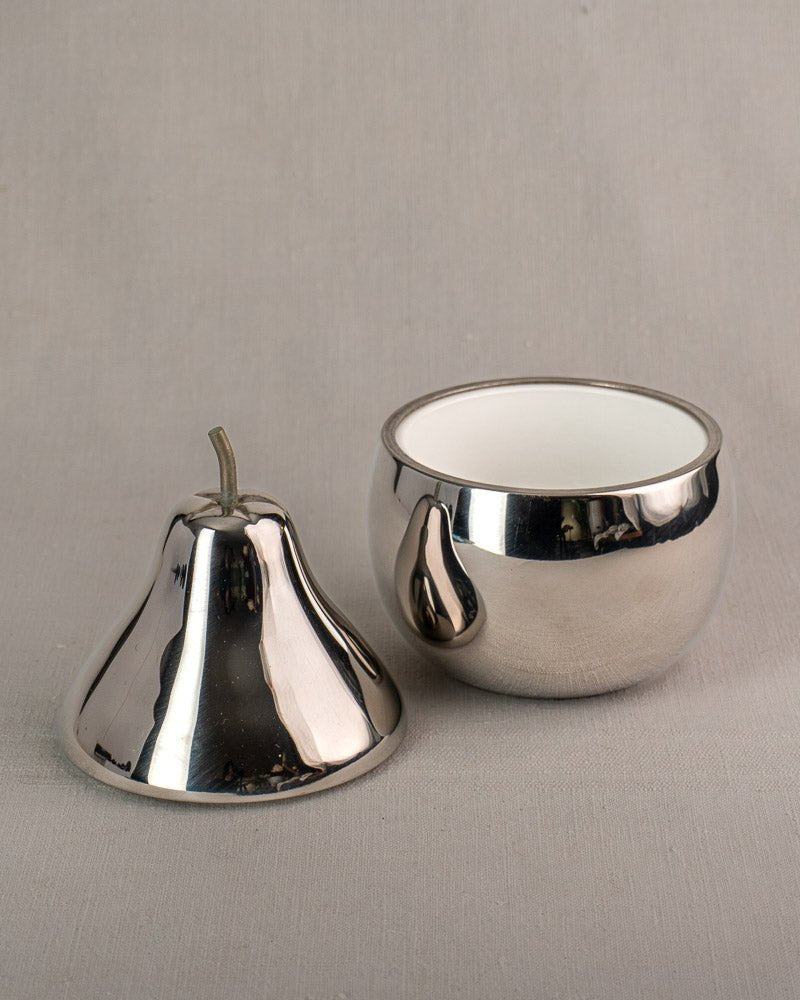 Vintage French pear-shaped stainless steel ice bucket from the 1960s with lid on neutral surface.