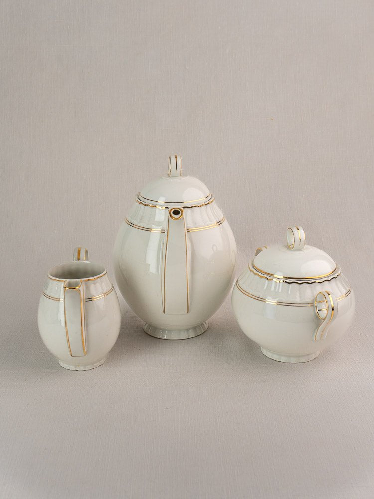 Set of three white Bernardaud porcelain containers with gold trim, inspired by Antique French Limoges.