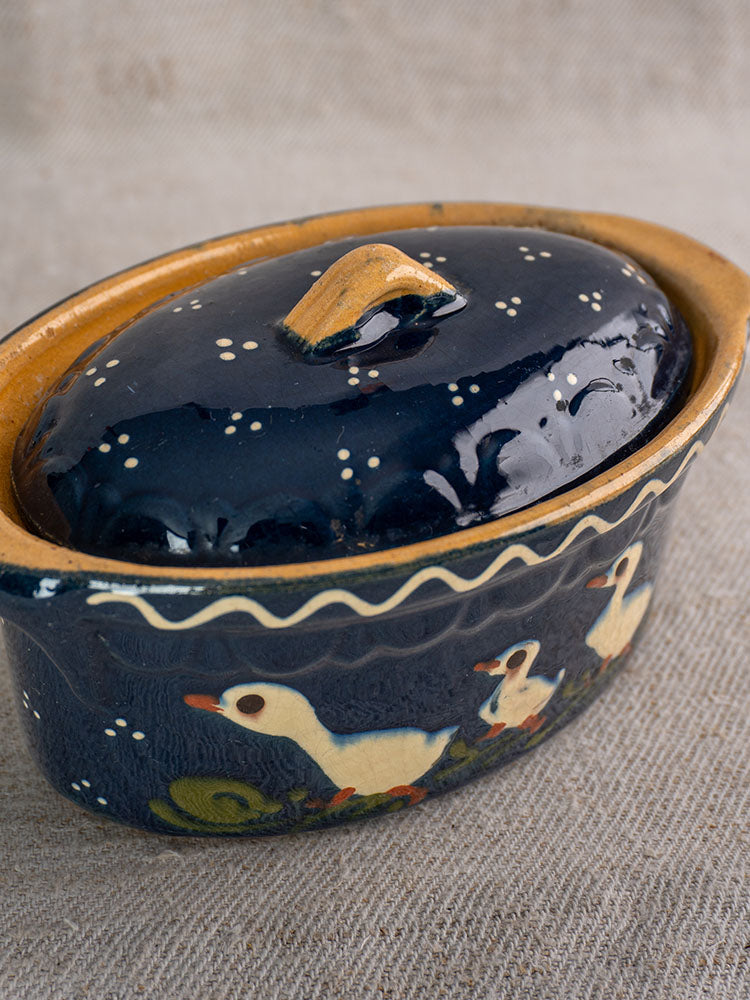 Antique French Soufflenheim ceramic terrine in cobalt blue with lid, featuring white duck decoration.