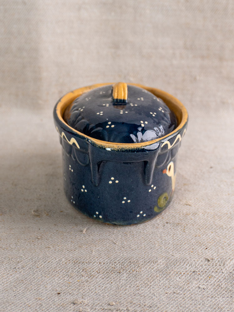 Antique French Soufflenheim terrine, cobalt blue with duck motif, mid-20th century, on neutral fabric surface.