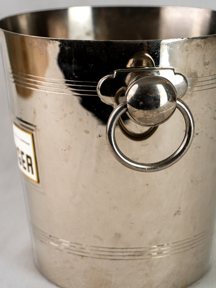 Taittinger vintage French plated Champagne bucket with round handle, engraved label, and minor surface marks.