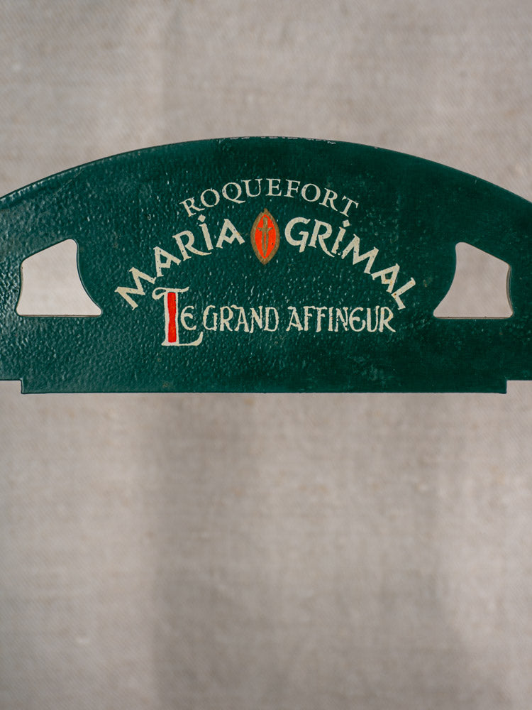 Vintage French Roquefort Maria Grimal Le Grand Affineur cheese cutter sign, circa 1960s, on light background.